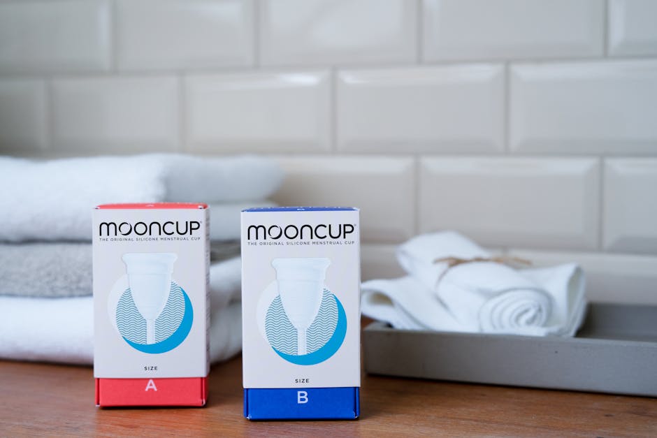 Stylish display of sustainable Mooncup products with towels in a bathroom setting.