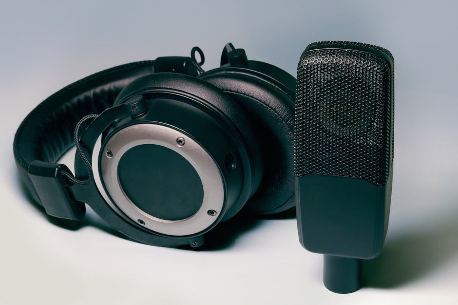 High-quality studio headphones and microphone for professional audio setups.